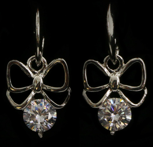 Silver tone cubic zirconia dangle earrings with a metal bow hanging from a crescent shaped hook and the stone faceted to the bottom of the bow CZ05A