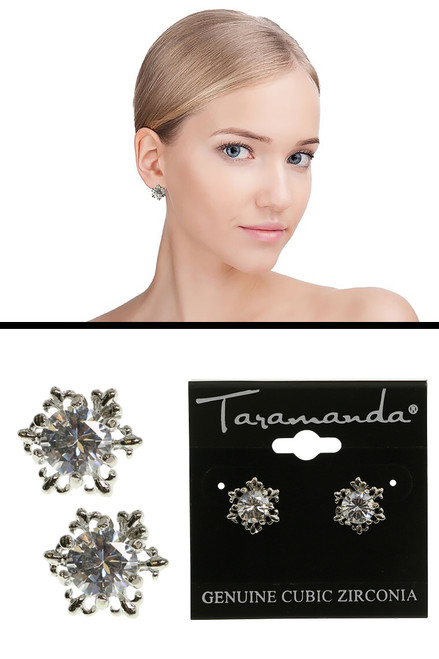 Silver tone cubic zirconia stud earrings with the stone topping a metal snowflake design CZ07A