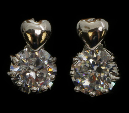 Silver tone cubic zirconia stud earrings with metal heart on the post and large stone beneath the heart CZ10A