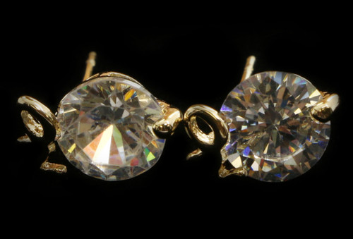 Gold tone cubic zirconia stud earrings with the words "yes" or "no" written in metal above the stone CZ13