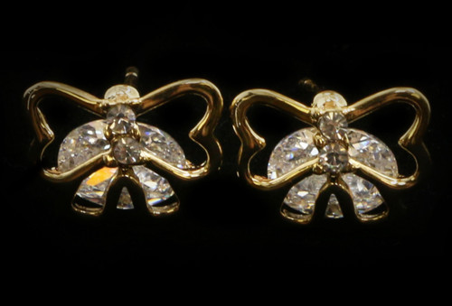 Gold tone cubic zirconia stud earrings with metal butterfly topping the stone CZ25