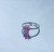 Silver paw ring with pink gemstone