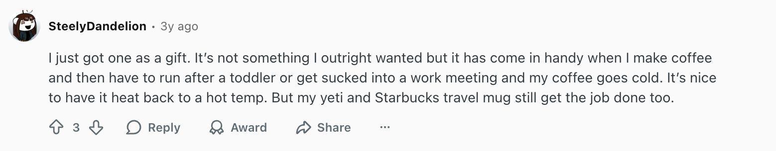Reddit comment by user SteelyDandelion describing receiving a travel mug as a gift and finding it useful for reheating coffee.