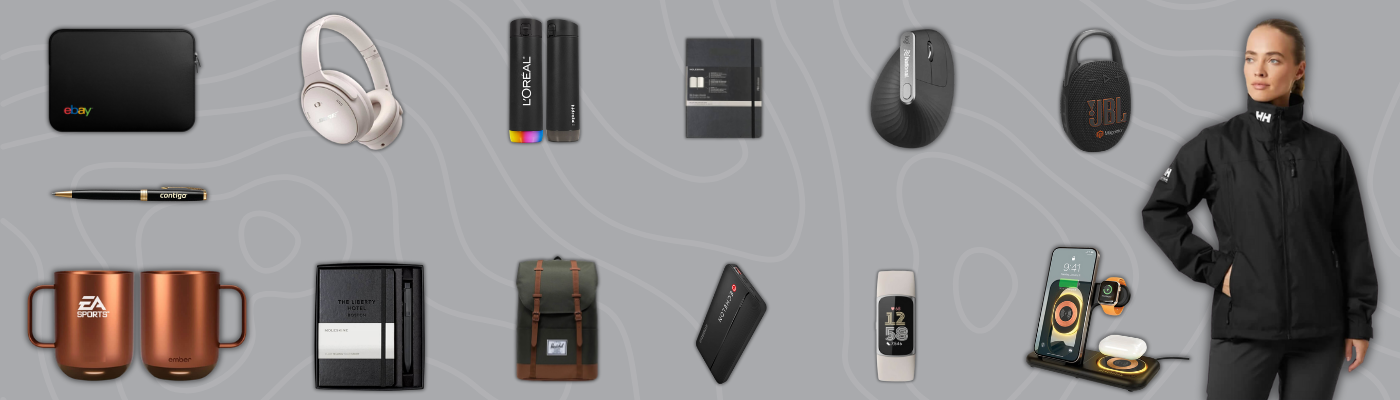 Assorted tech gadgets, drinkware, backpacks, headphones, and apparel arranged as New Year Gifts for Employees on a gray background.