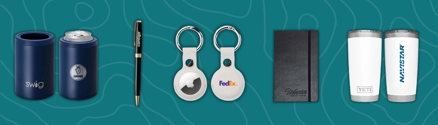 Swig can coolers, Contigo pen, Apple AirTag keychains with FedEx logo, black Moleskine notebook, and white YETI tumblers on teal background.
