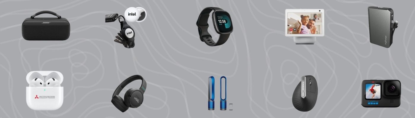 A collection of modern tech gifts, including wireless earbuds, smartwatches, portable speakers, noise-cancelling headphones, a smart display, a compact camera, a wireless mouse, and slim power banks, arranged on a grey, patterned background.