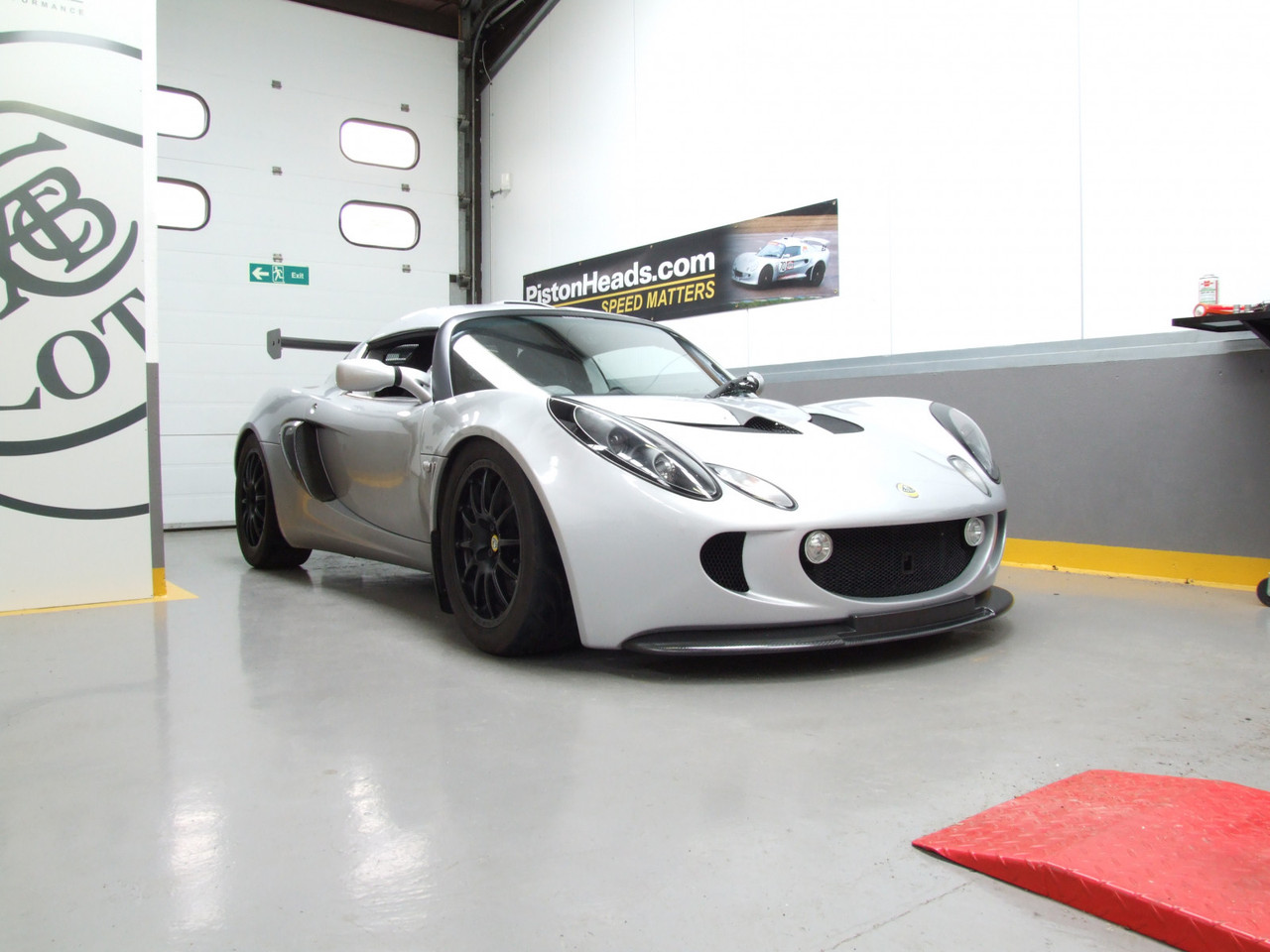 Reverie Lotus Exige S2 Carbon Fibre Front Spoiler - Bolt On, OEM Style, Polished Finish (REV-R01SB0328)