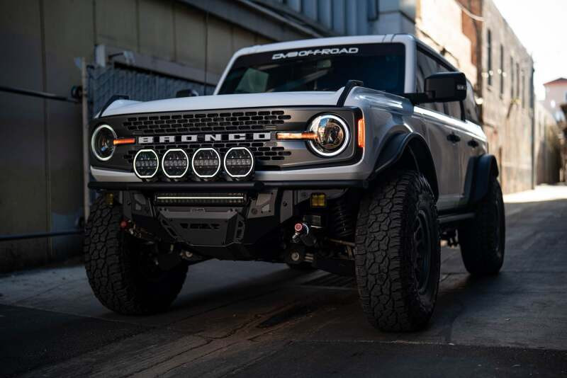 DV8 Offroad 7in Halo Elite Round Light w/ Accent Halo - White/Amber - BE7RW108W-H Photo - out of package