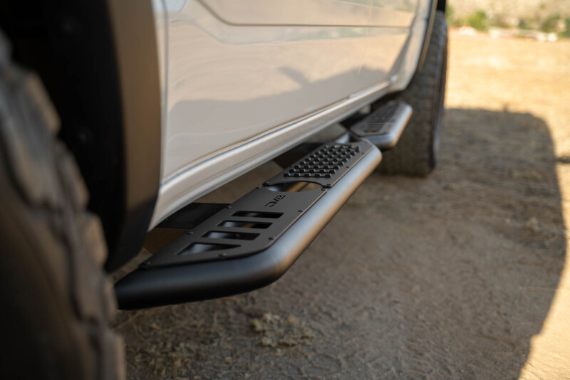 DV8 Offroad 19-25 RAM 1500 Crew Cab OE Plus Side Steps - Black Steel - SRDR1-01 Photo - out of package