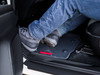 BaseLayer Custom-Fit All-Weather Floor Liners for the Toyota Tacoma 2016 - 2023 Double Cab. Driver side with dirty boots.