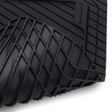View of the underside of the BaseLayer Cut-to-Fit 4-Piece Floor Mat Set.