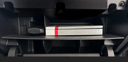 Vehicle OCD by BaseLayer glove box organizer installed with vehicle books in the Toyota 4Runner 2025+.