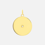 This round engravable gold diamond charm pendant is made in 14k gold and a streamlined profile.