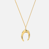 Harness new moon energy with exciting gold crescent moon necklace, looking at it from another side.