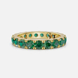 Elegant Emerald Eternity Band - Preparation View: Detailing the exquisite craftsmanship and intricate details.