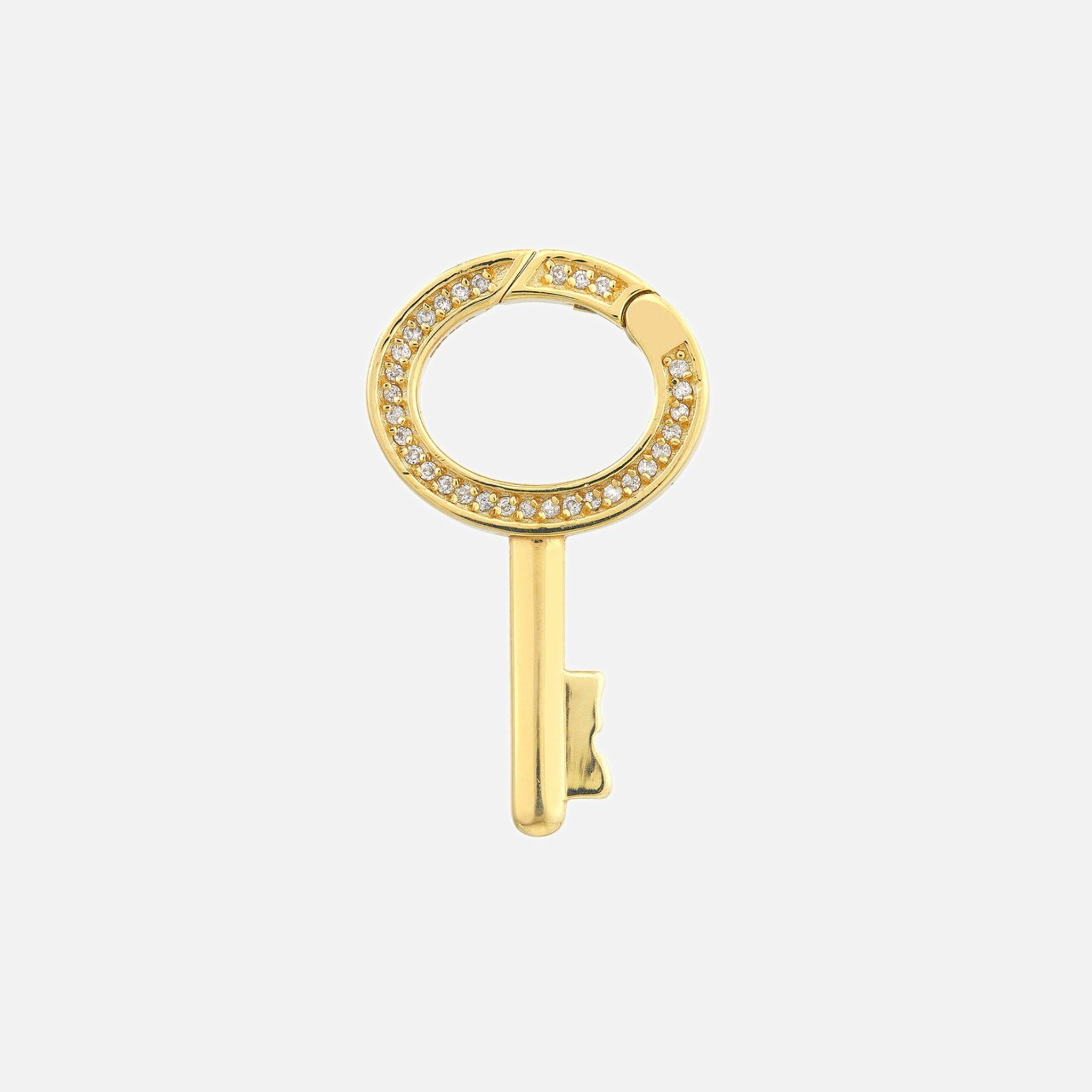 Our diamond key pendant debuts in glistening 14k yellow gold. Its oval silhouette is trimmed with dainty 0.17 CTW white diamonds.