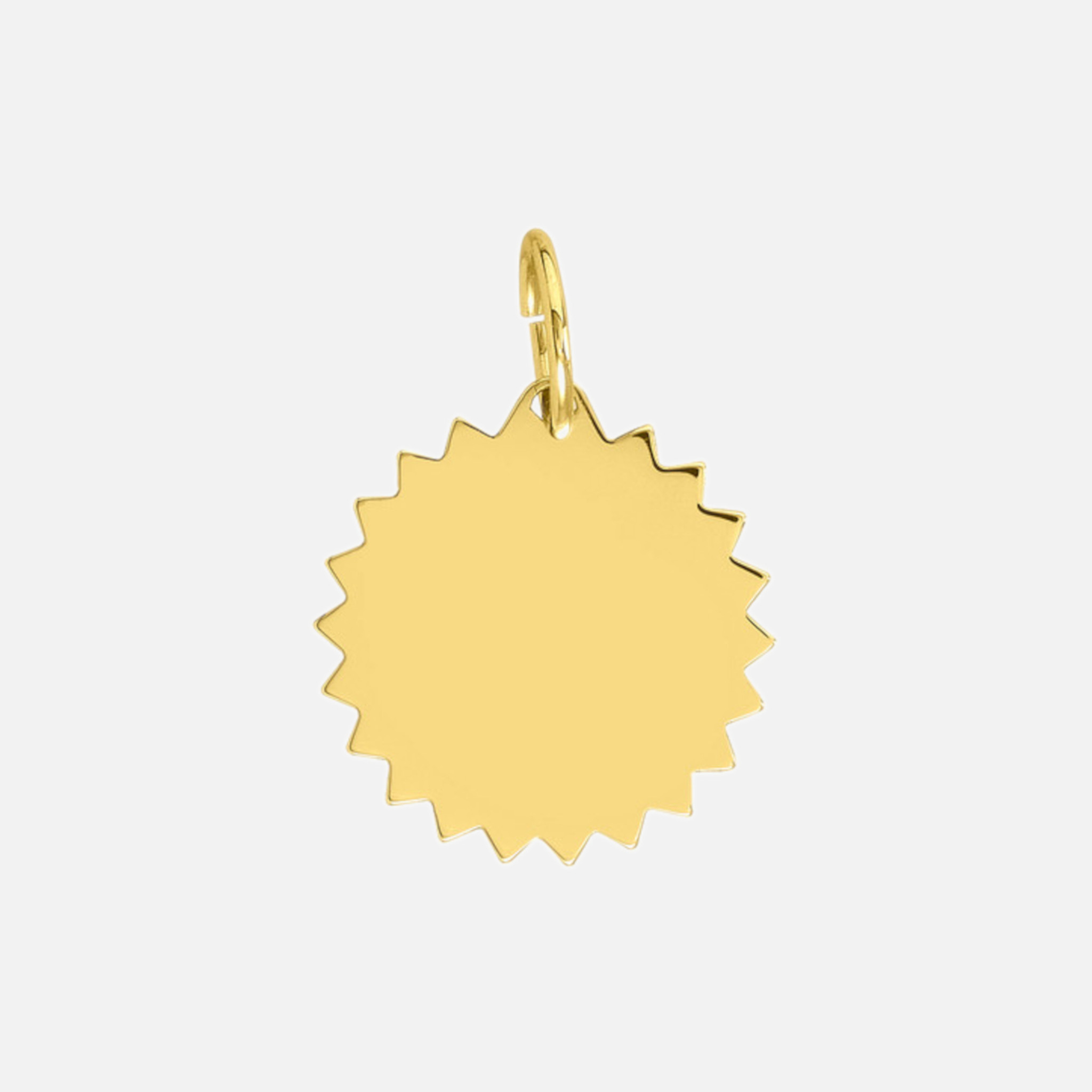 Handcrafted in 14k gold, this engravable charm features modern jagged edges that cast light everywhere you go.