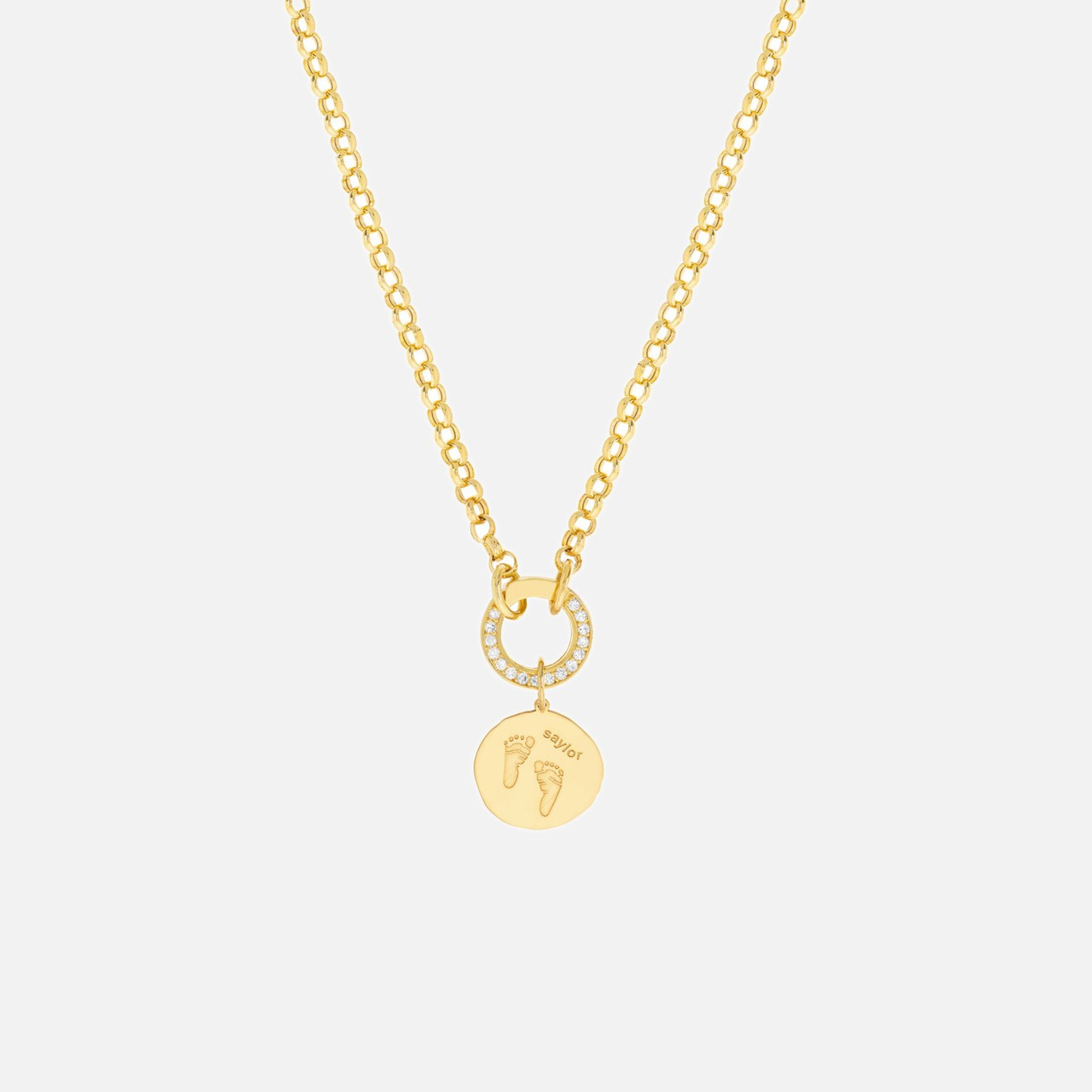 Layer this gold initial charm with sparkling diamond pendants and other jewelry beads and findings.