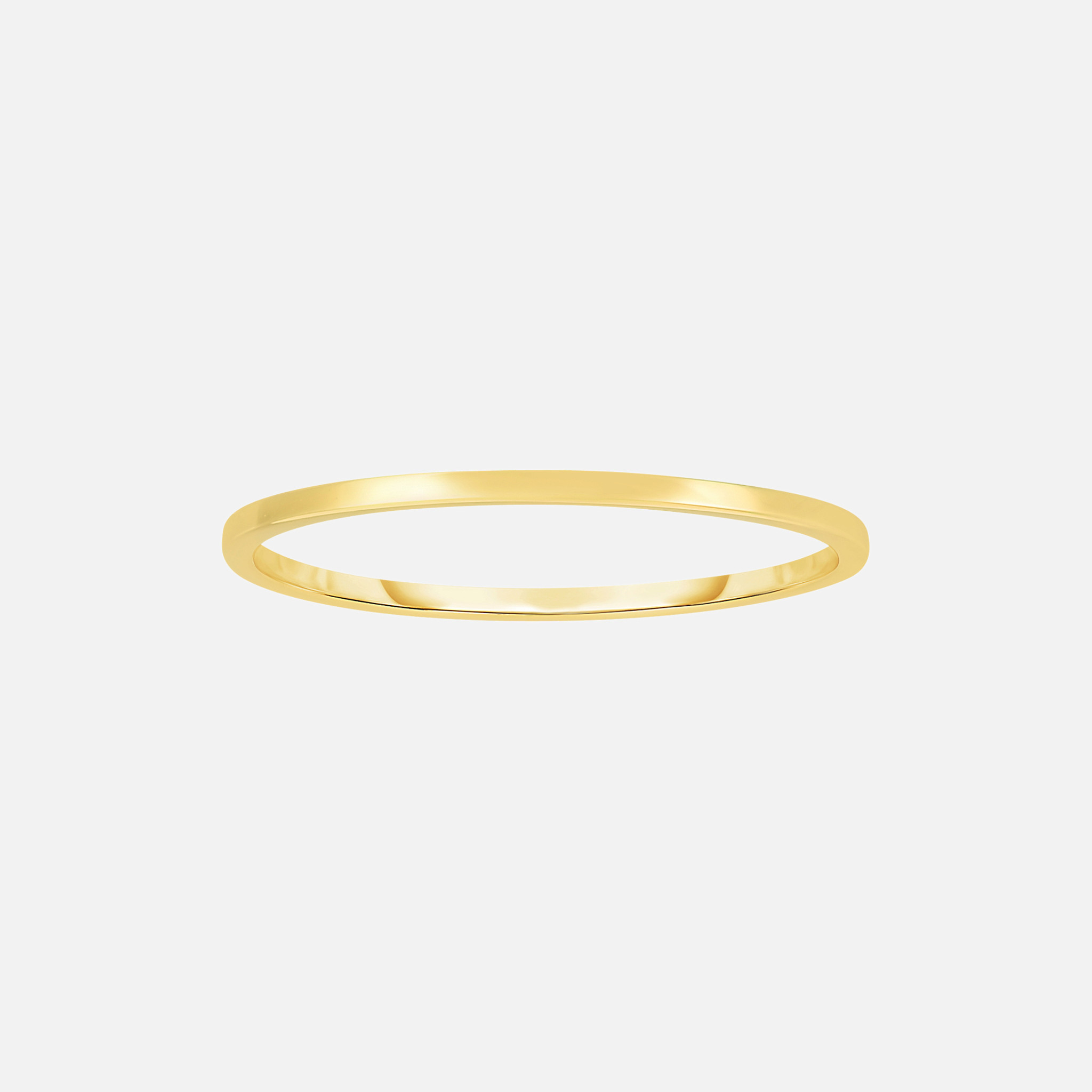A solid essential, this thin gold band ring is crafted in 14k.
