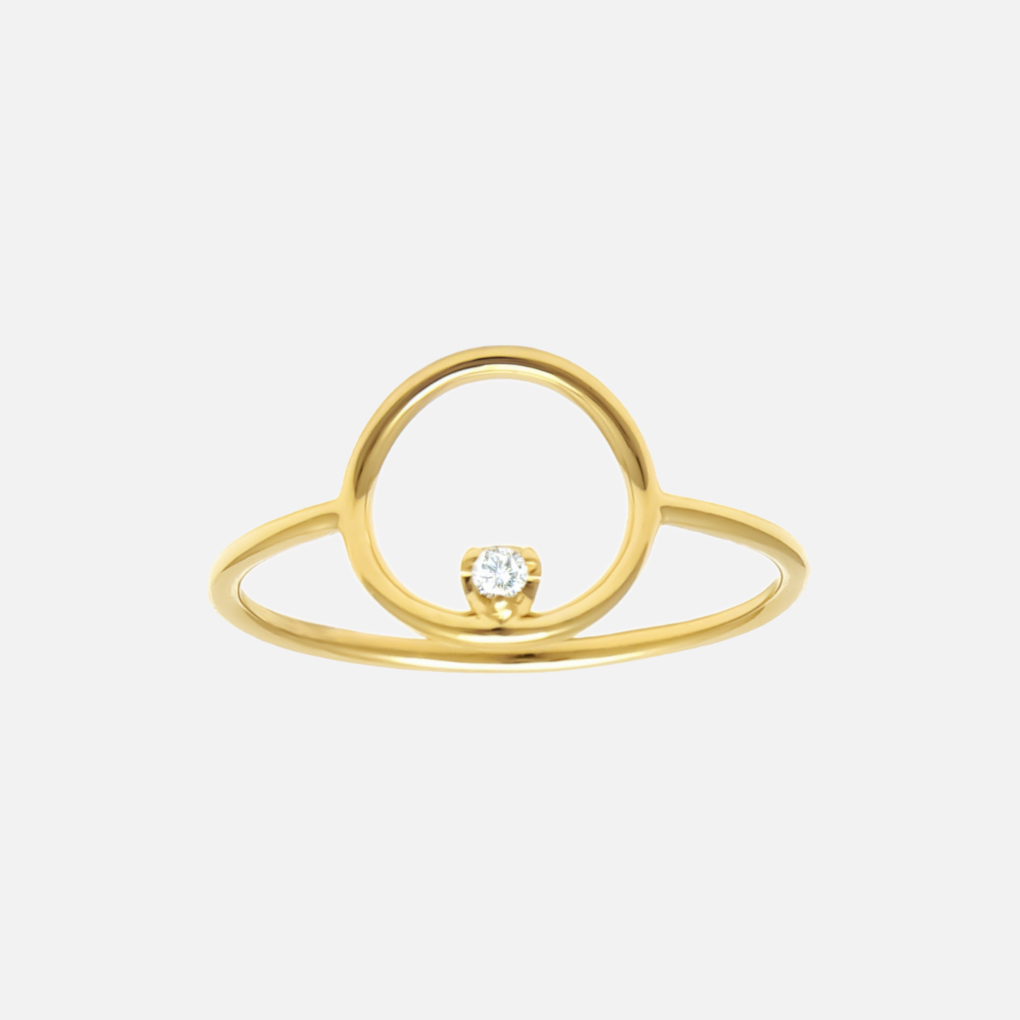 Expertly handcrafted in shiny 14k gold, this thin diamond orbit ring features a single round cut diamond with a .02 CTW, adding a touch of brilliance to its design.