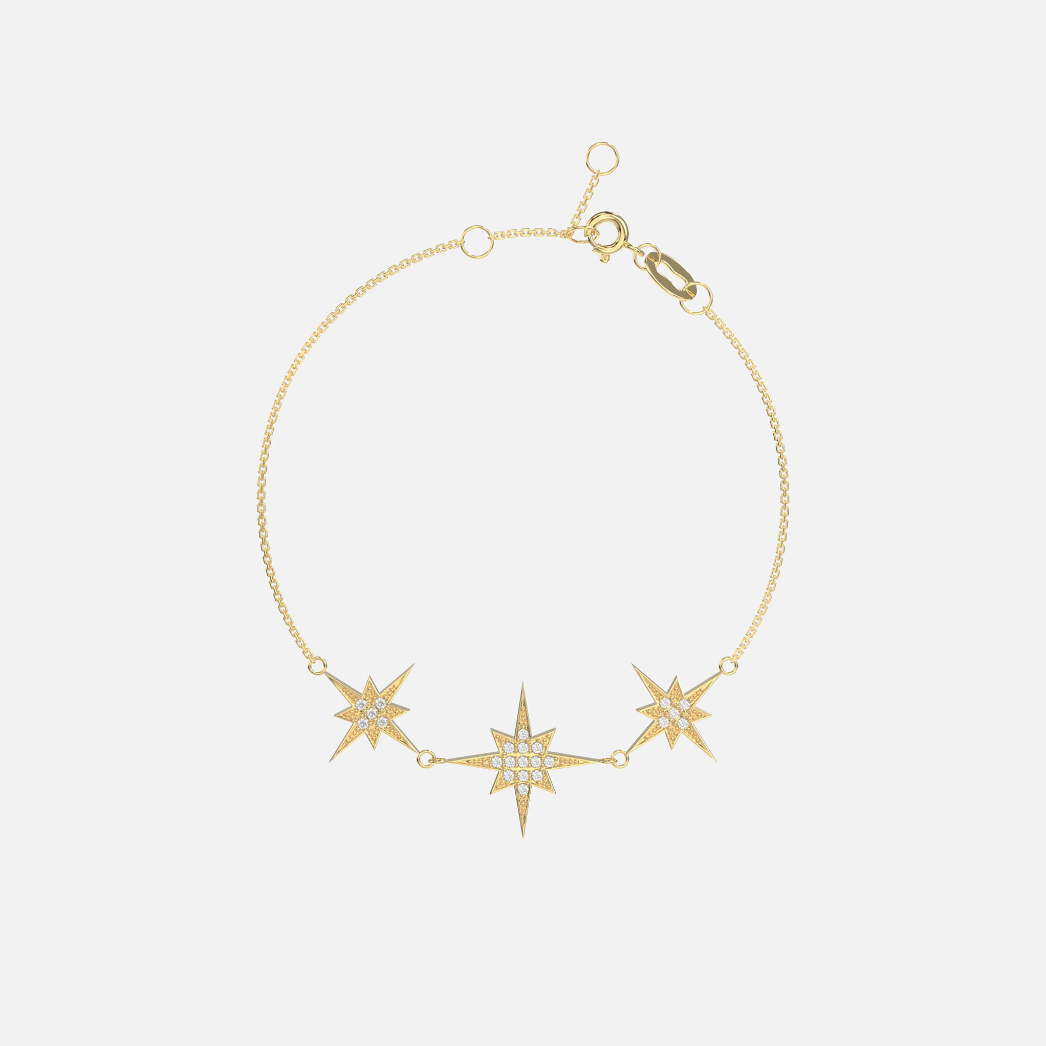 Diamond Star Bracelet: Captivating 14k gold with three dazzling north star pendants.