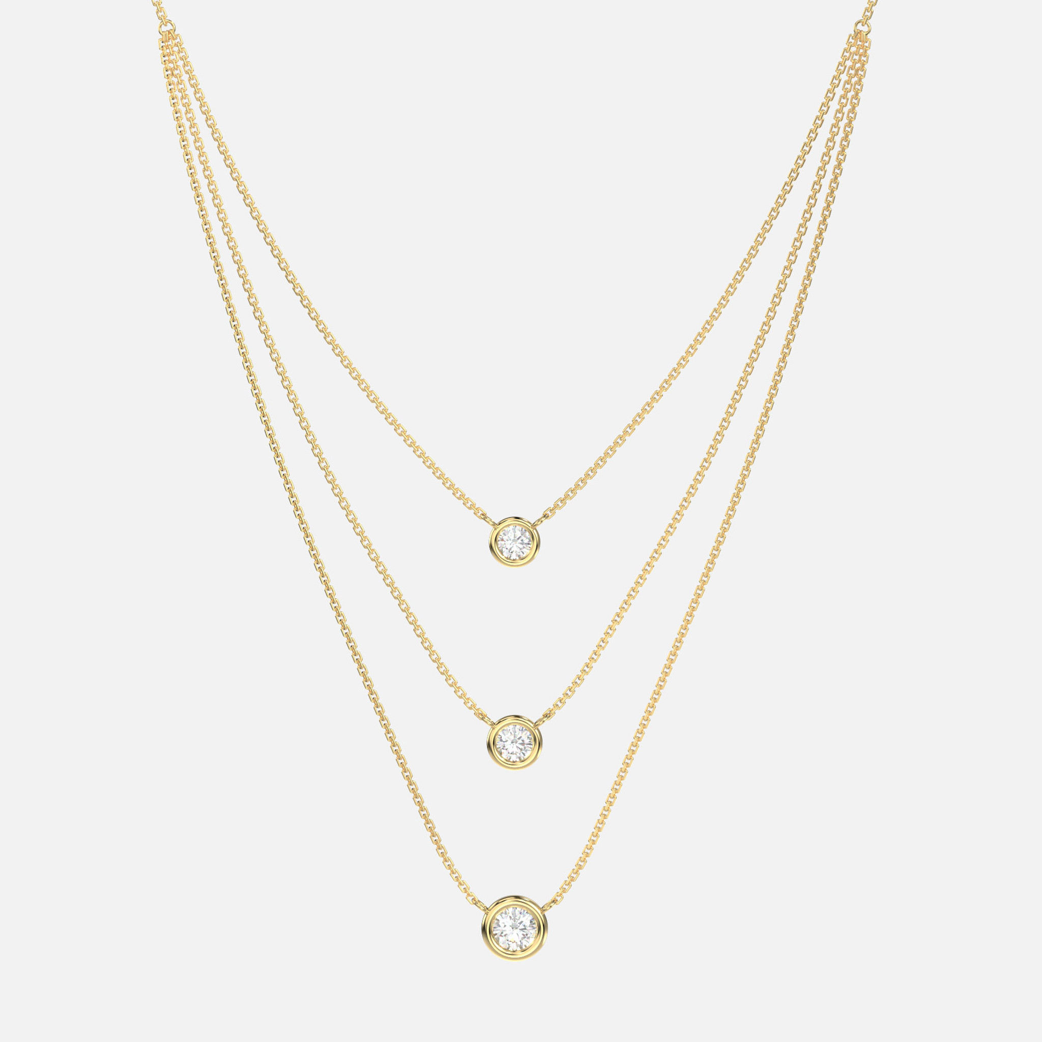 Embrace elegance with the luxurious Bezel Set Diamond Trio Necklace, carefully cast in lush 14k gold.