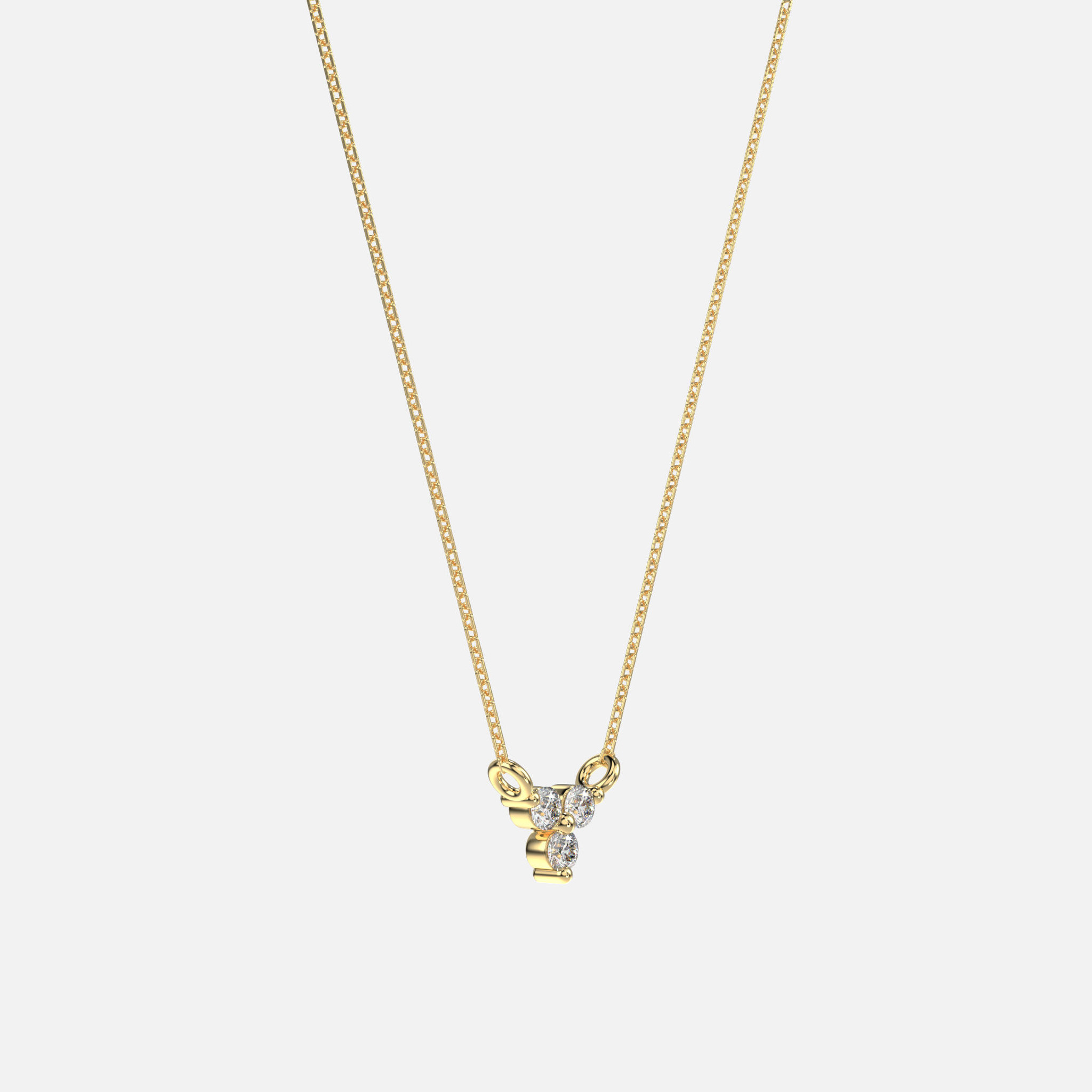 Delicate gold accessories, such as the 14k yellow gold diamond trio necklace, hold intricate meanings and can be layered for a chic statement.