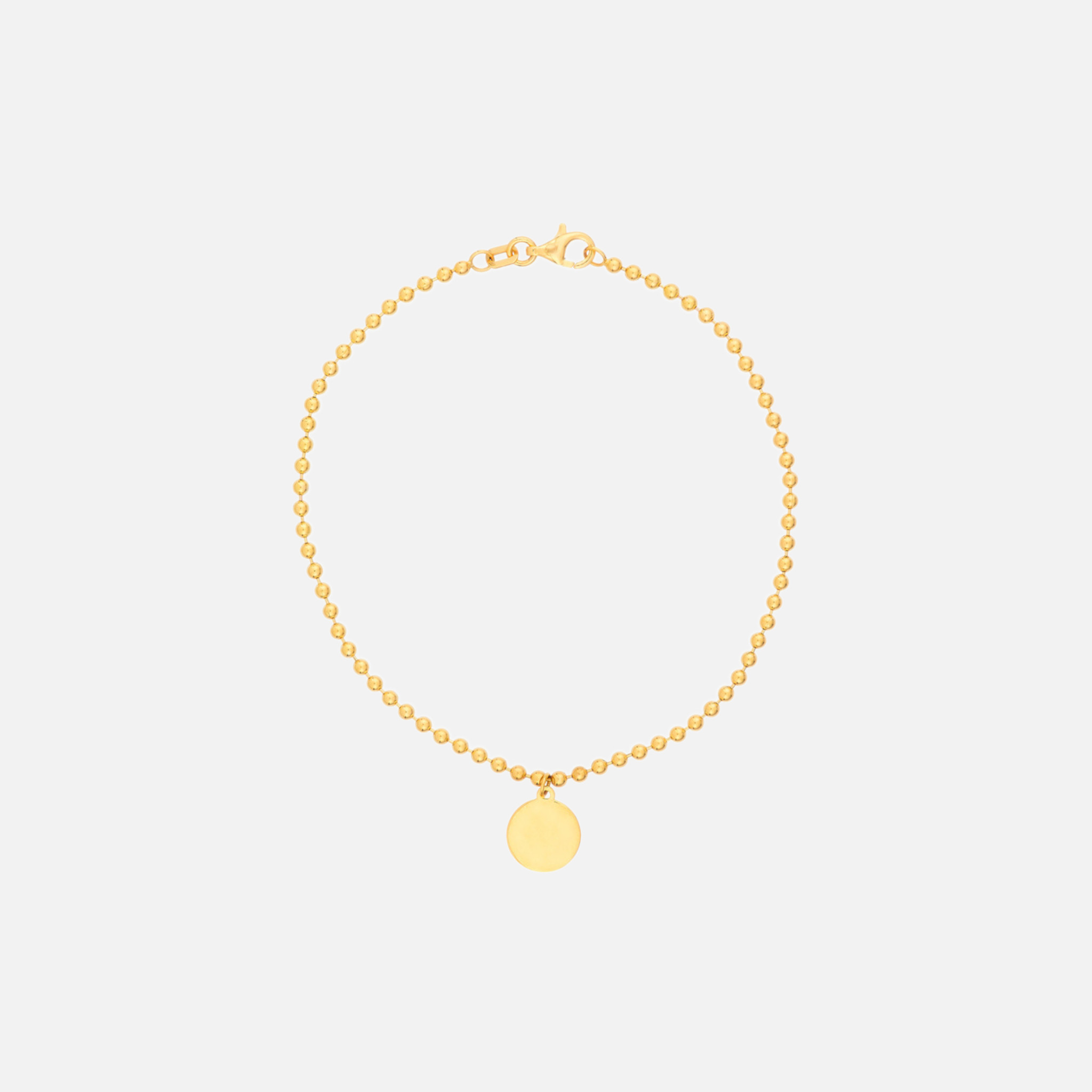 Handcrafted shiny 14k gold ball chain bracelet with an engravable coin charm.
