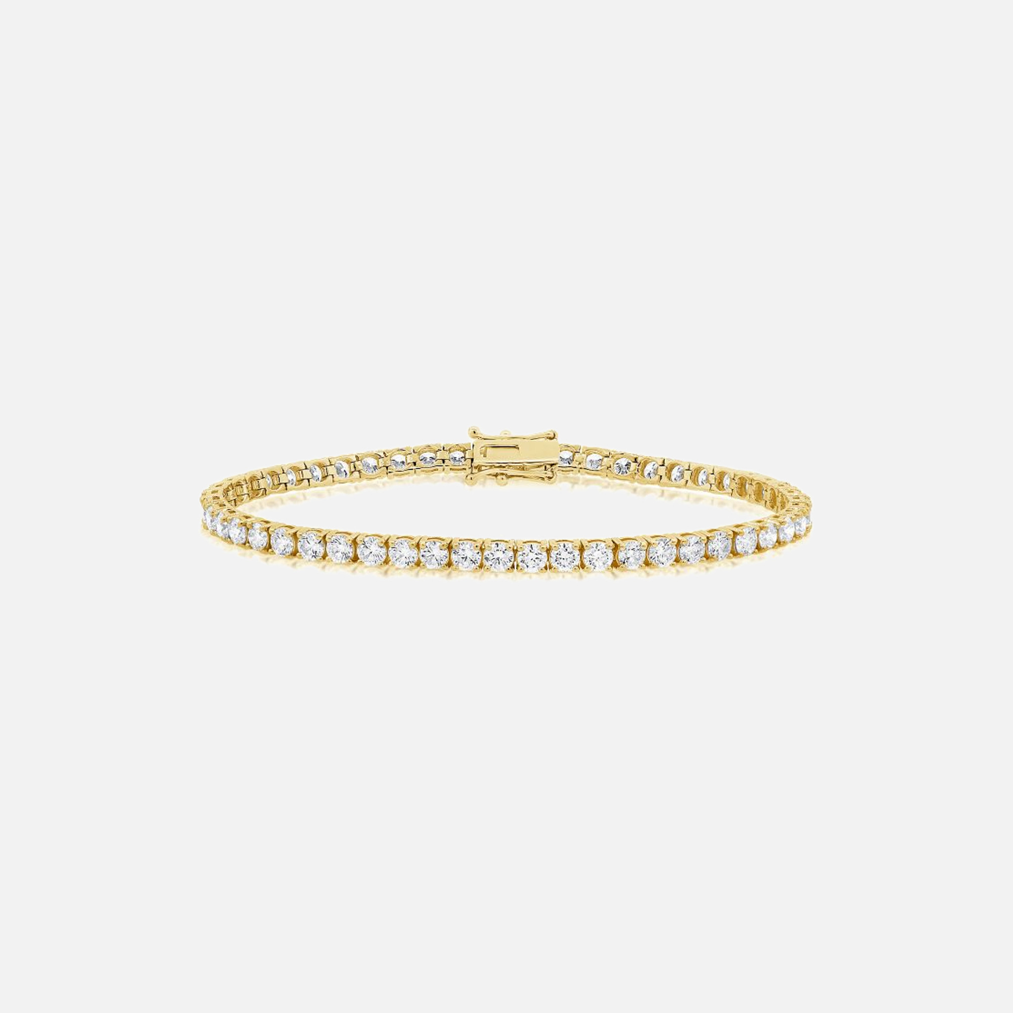 A gold diamond tennis bracelet featuring a cheerful line of brilliant cut white diamonds totaling 1.49 carats. The bracelet is crafted in sleek and shiny yellow gold and fastened securely with a box lock clasp.