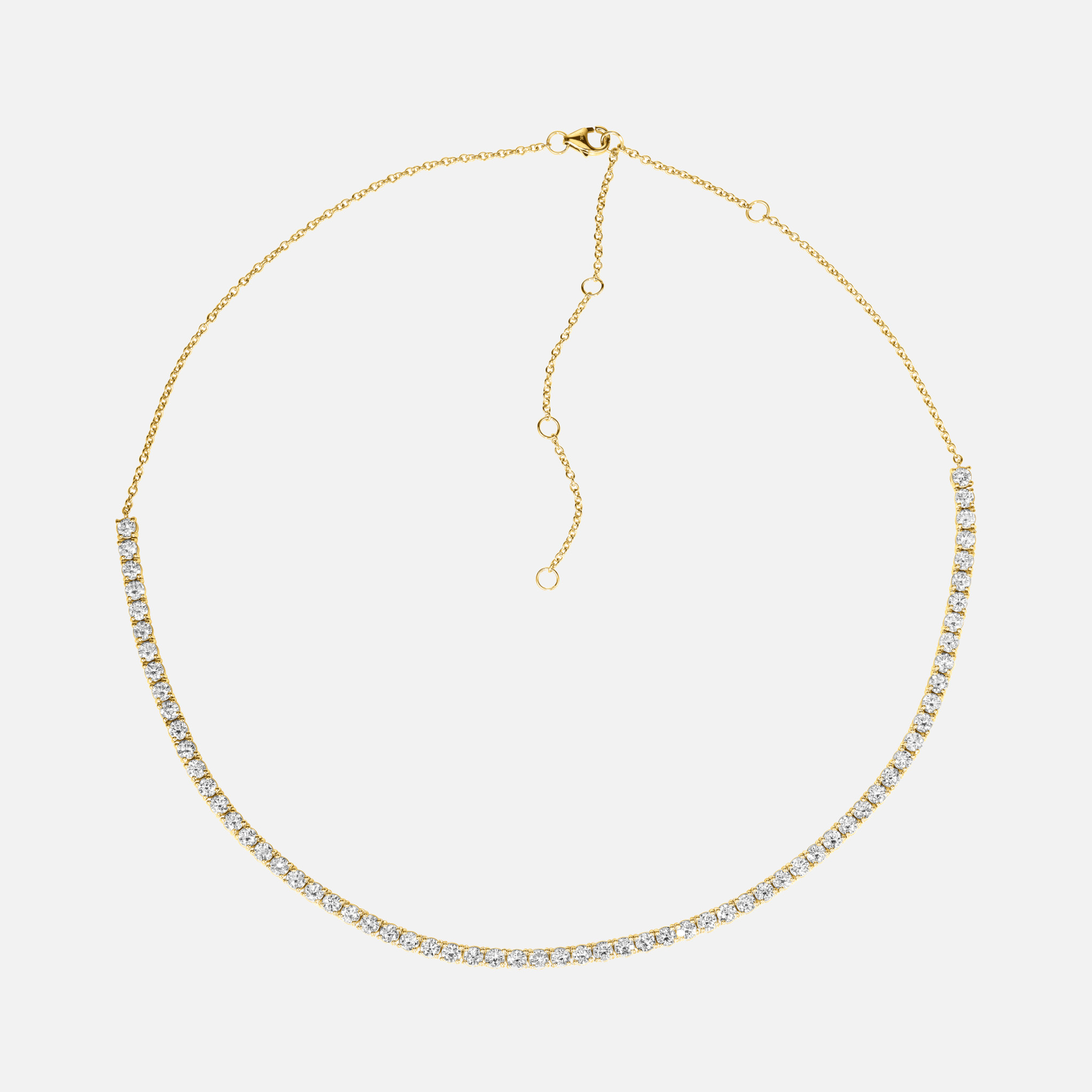 A stunning diamond tennis chain necklace in sleek white gold, featuring an extendable cable chain with .92 carats of brilliant cut white diamonds.