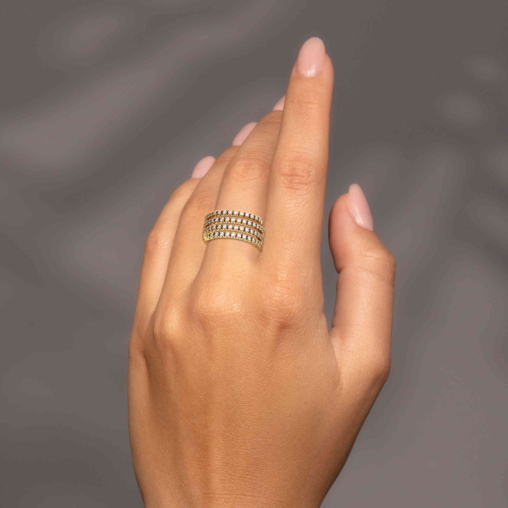 14k Gold Diamond Wrap Ring shown on the hand of a light-skinned model.