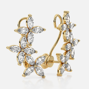 Elevate your style in 18k gold with these ear crawler earrings adorned with exquisite marquise diamonds, offering a subtle and luxurious accent that gracefully ascends and descends the lobe.