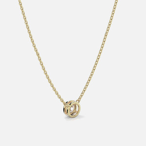 The back view of this solitaire diamond necklace features an 18k gold cable chain.