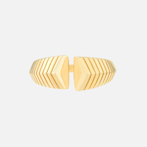 Close-up view of the 14k yellow gold chevron ring, highlighting its unique opening showcasing sleek design.