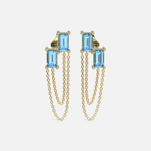 Our Blue Topaz Birthstone Stud Earrings, 3x5mm blue topaz stones connected by a 10mm chain signify enduring friendship.