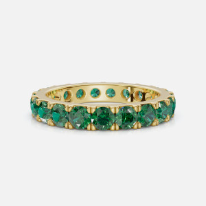 Elegant Emerald Eternity Band - Preparation View: Detailing the exquisite craftsmanship and intricate details.