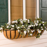XL English Garden Hayrack with white flowers mounted under a window with green shutters XL English Garden Hayrack with white flowers mounted under a window with green shutters