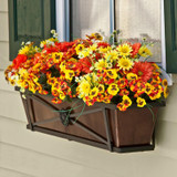 36" Medallion window box with oil rubbed bronze liner, with autumnal flowers mounted on house with green shutters