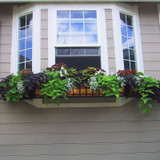 Pacific Heights Copper Window Box mounted under windows