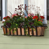 Venetian window box with copper liner mounted to a house with shutters