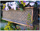 La Fleur fiberglass window box coated with liquid copper La Fleur fiberglass window box coated with liquid copper