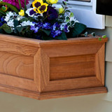 Framed Cottage Cedar Railing Planter, close-up of wooden planter box with flowers planted inside.