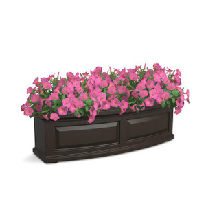 Presidential Railing Planter, a rectangular black planter filled with pink petunias.