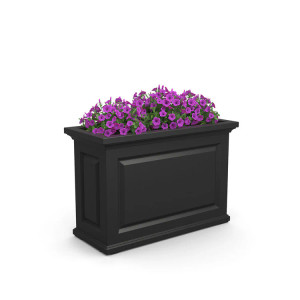 Black Presidential Trough Planter with purple flowers on white background Black Presidential Trough Planter with purple flowers on white background