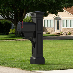 Laurelhurst Mail Post, a black classic style mailbox with a decorative post and a curved mailbox door, installed on a well-manicured lawn in front of a house with large windows and a stone porch. Laurelhurst Mail Post, a black classic style mailbox with a decorative post and a curved mailbox door, installed on a well-manicured lawn in front of a house with large windows and a stone porch.