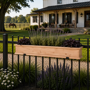 Laguna Cedar Railing Planter on a wrought iron fence in front of a home.