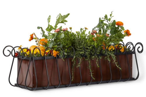 Angled view of Heatherbrook window box with oil rubbed bronze liner, planted with autumnal foliage on white background