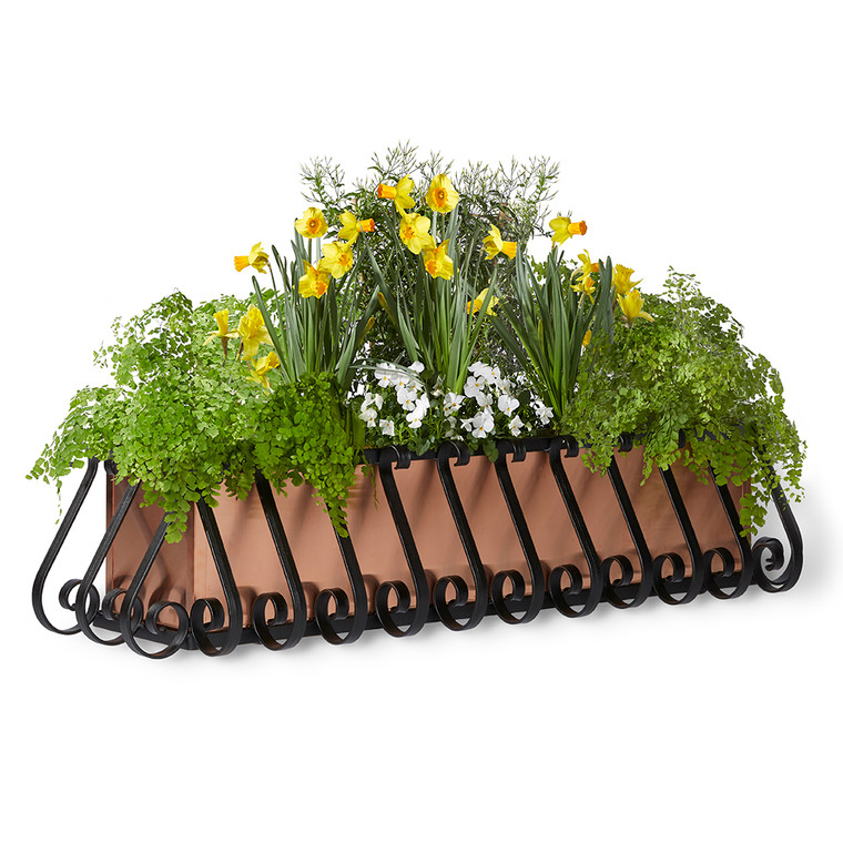 European window box with copper liner planted with flowers