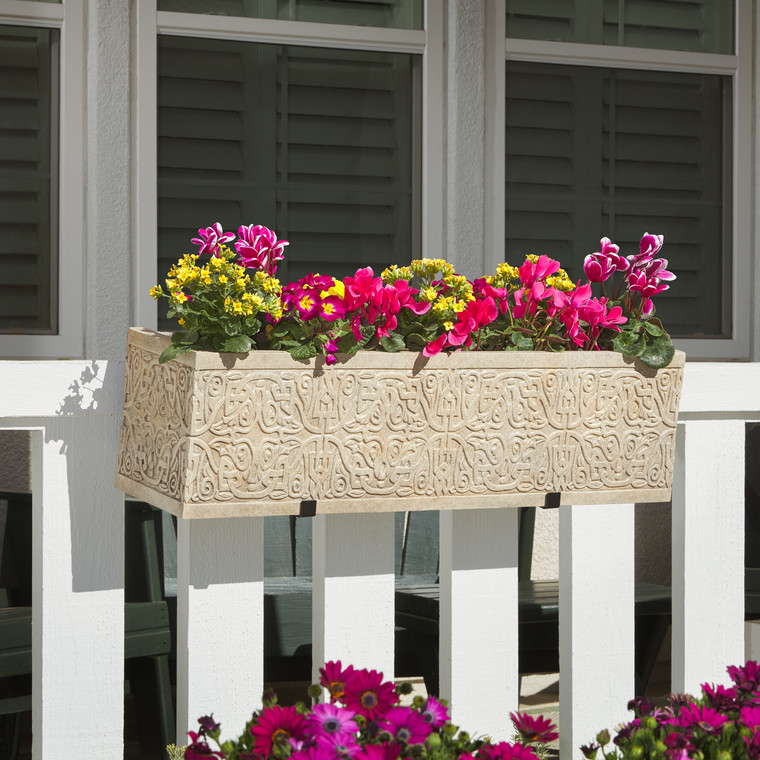 Jaadar Fiberstone Railing Planter on white wood railing with pink flowers