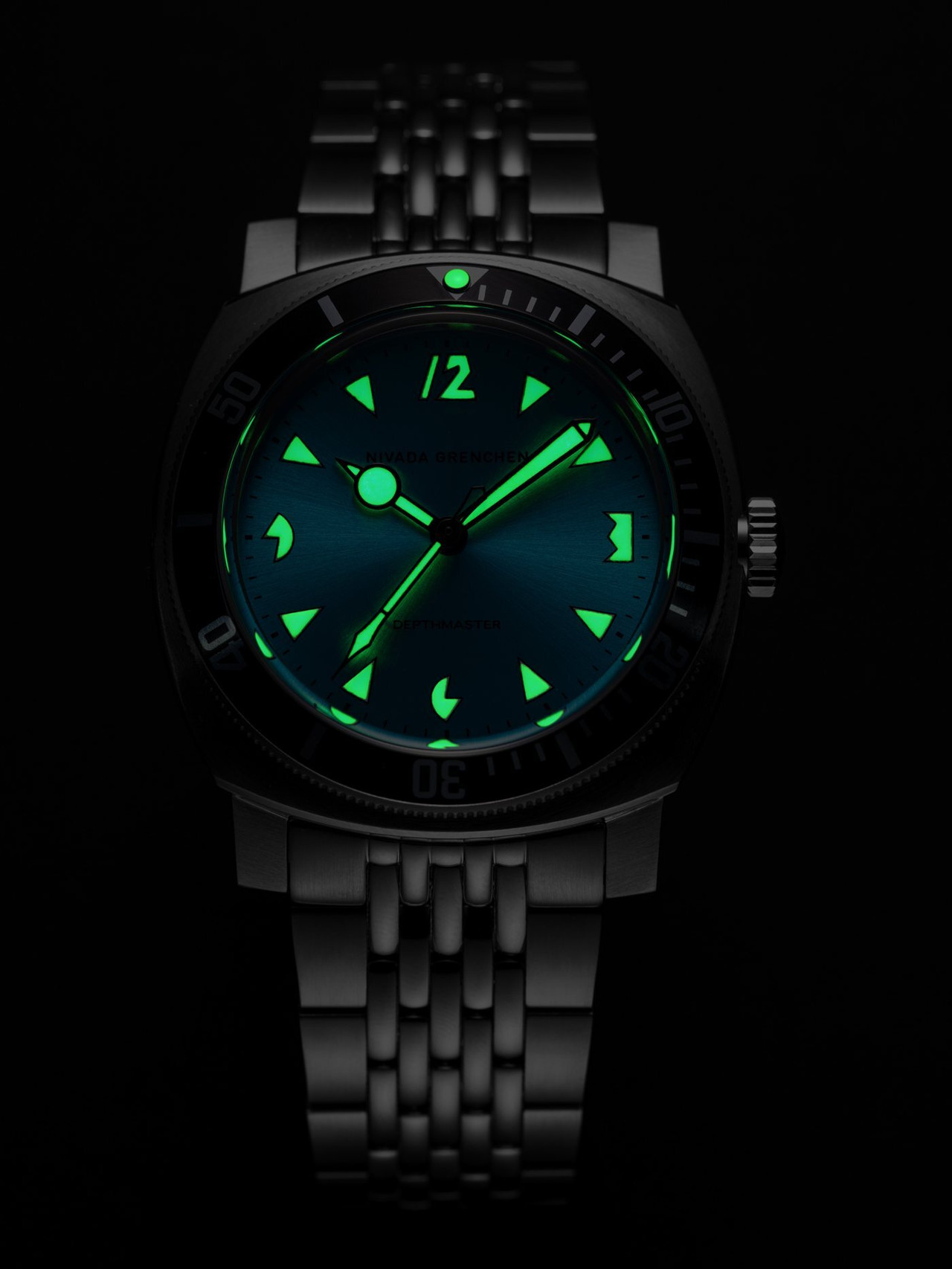 The dial glowing green in the dark